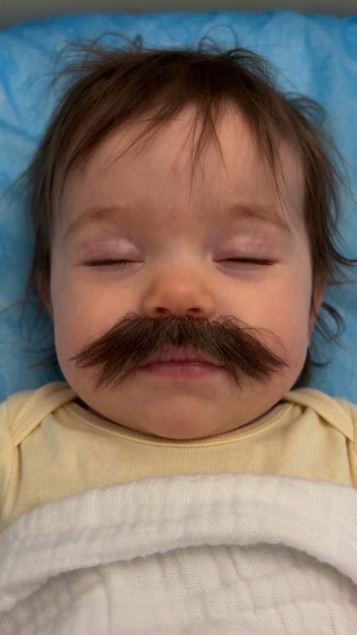 Baby With Mustache example video, made with AI-made people